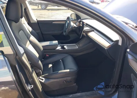 2023 Tesla Model Y Awd/Long Range Dual Motor All-Wheel Drive z USA, uszkodzony, nr VIN 7SAYGAEE4PF850527